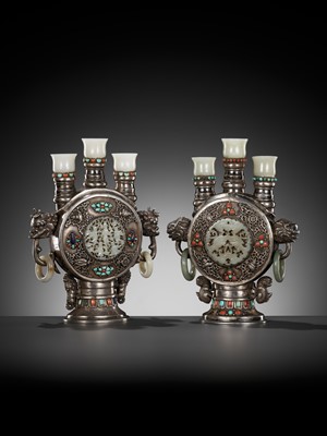 Lot 291 - A PAIR OF MONGOLIAN GEMSTONE-INLAID AND JADE-MOUNTED SILVER CANDLE HOLDERS