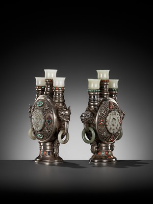 Lot 291 - A PAIR OF MONGOLIAN GEMSTONE-INLAID AND JADE-MOUNTED SILVER CANDLE HOLDERS