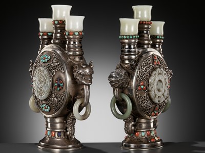 Lot 291 - A PAIR OF MONGOLIAN GEMSTONE-INLAID AND JADE-MOUNTED SILVER CANDLE HOLDERS