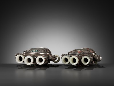 Lot 291 - A PAIR OF MONGOLIAN GEMSTONE-INLAID AND JADE-MOUNTED SILVER CANDLE HOLDERS