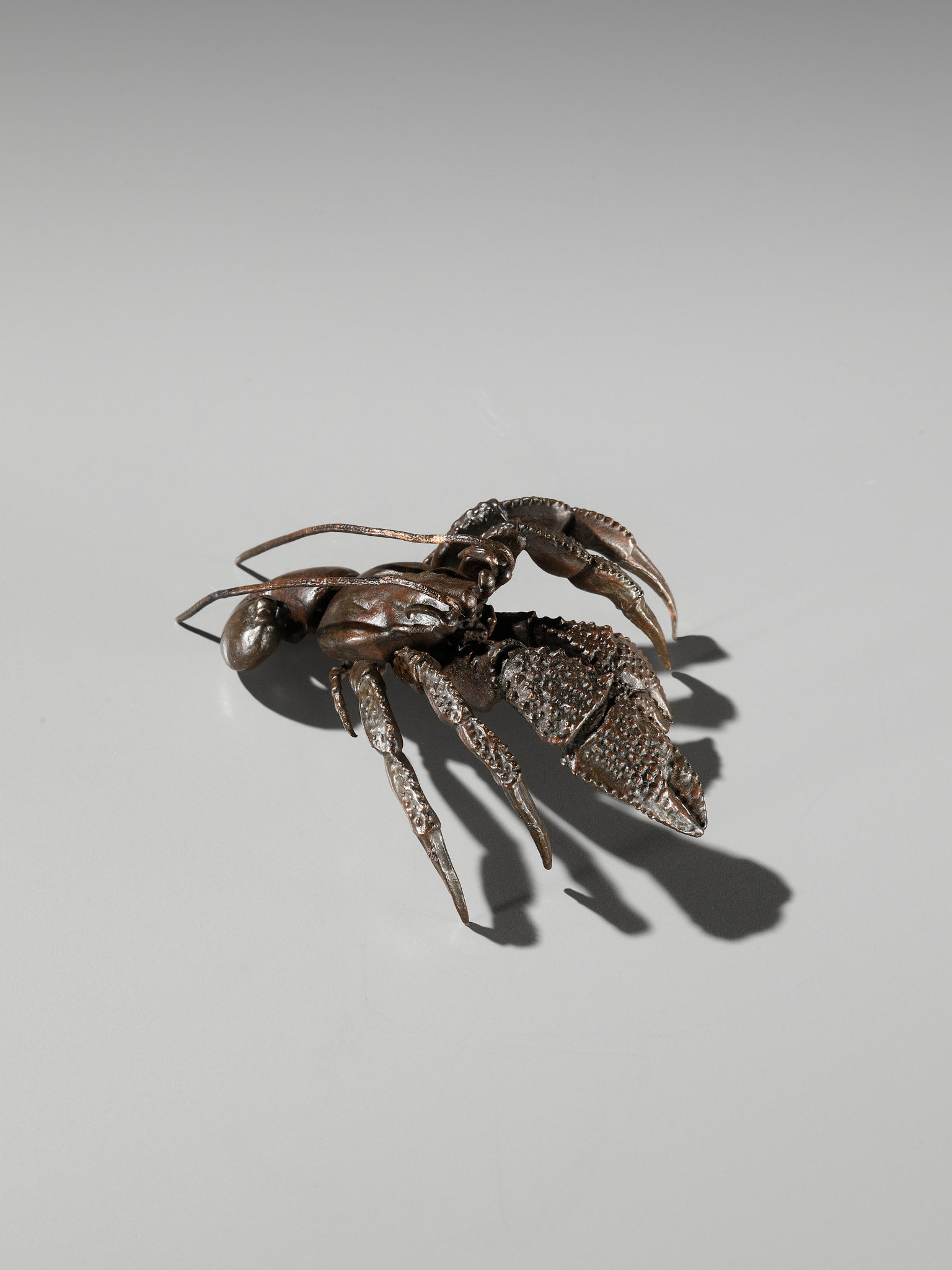 Lot 136 - YASUNOSUKE: A RARE BRONZE JIZAI OKIMONO OF A