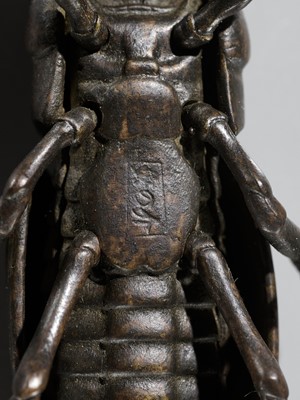 YASUNOSUKE: A BRONZE JIZAI OKIMONO OF A GRASSHOPPER