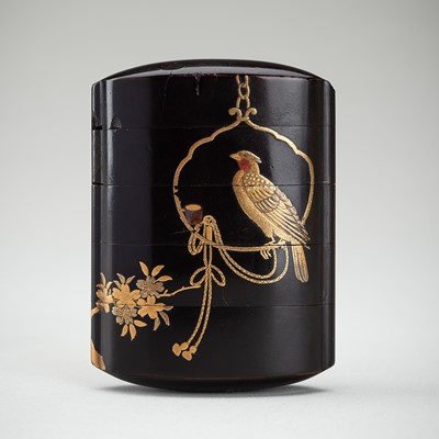 A SIGNED FOUR-CASE LACQUER INRO DEPICTING A PET BIRD AND CHERRY BLOSSOMS