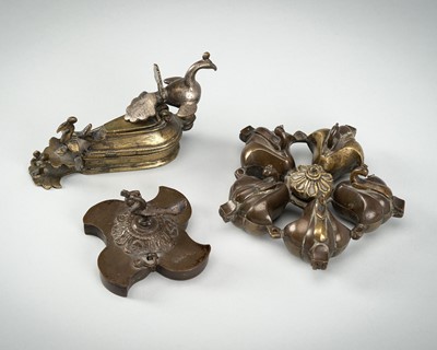 A GROUP OF THREE BRASS ‘PEACOCK’ RITUAL CONTAINERS