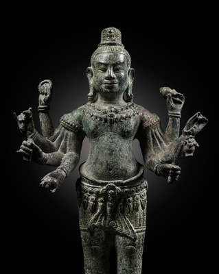 Lot 598 - A RARE AND IMPORTANT BRONZE FIGURE OF AVALOKITESHVARA, ANKGOR PERIOD, BAYON STYLE