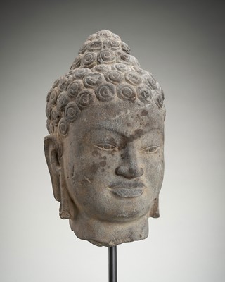 Lot 1006 - A SANDSTONE HEAD OF BUDDHA, MON-DVARAVATI PERIOD