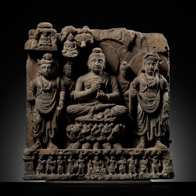 Lot 230 - A RARE SCHIST RELIEF TRIAD OF BUDDHA SHAKYAMUNI WITH BODHISATTVAS, ANCIENT REGION OF GANDHARA, 4TH-5TH CENTURY