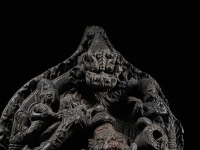 Lot 246 - A RARE BLACK STONE STELE OF NARASIMHA KILLING HIRANYAKASHIPU, PALA PERIOD