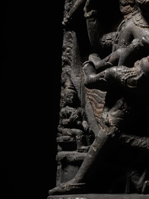 Lot 246 - A RARE BLACK STONE STELE OF NARASIMHA KILLING HIRANYAKASHIPU, PALA PERIOD