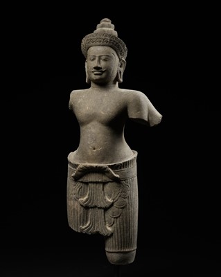 A LARGE SANDSTONE FIGURE OF A FOUR-ARMED VISHNU, ANGKOR PERIOD, PRE-RUP STYLE