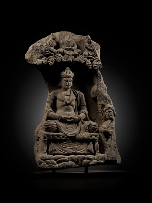 Lot 337 - A GRAY SCHIST STELE OF THE BODHISATTVA MAITREYA WITH A DEVOTEE, ANCIENT REGION OF GANDHARA, 3RD-4TH CENTURY