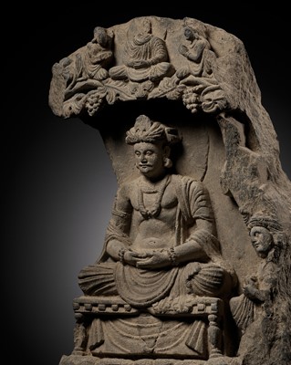 A GRAY SCHIST STELE OF THE BODHISATTVA MAITREYA WITH A DEVOTEE, ANCIENT REGION OF GANDHARA, 3RD-4TH CENTURY