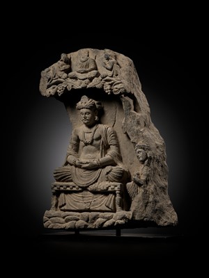 Lot 337 - A GRAY SCHIST STELE OF THE BODHISATTVA MAITREYA WITH A DEVOTEE, ANCIENT REGION OF GANDHARA, 3RD-4TH CENTURY