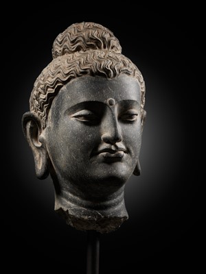 Lot 222 - A GRAY SCHIST HEAD OF BUDDHA, ANCIENT REGION OF GANDHARA, 2ND-3RD CENTURY