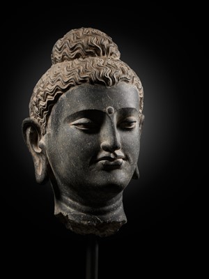 Lot 222 - A GRAY SCHIST HEAD OF BUDDHA, ANCIENT REGION OF GANDHARA, 2ND-3RD CENTURY
