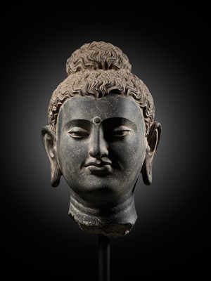 Lot 222 - A GRAY SCHIST HEAD OF BUDDHA, ANCIENT REGION OF GANDHARA, 2ND-3RD CENTURY