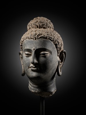 Lot 222 - A GRAY SCHIST HEAD OF BUDDHA, ANCIENT REGION OF GANDHARA, 2ND-3RD CENTURY