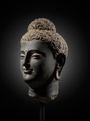 Lot 222 - A GRAY SCHIST HEAD OF BUDDHA, ANCIENT REGION OF GANDHARA, 2ND-3RD CENTURY