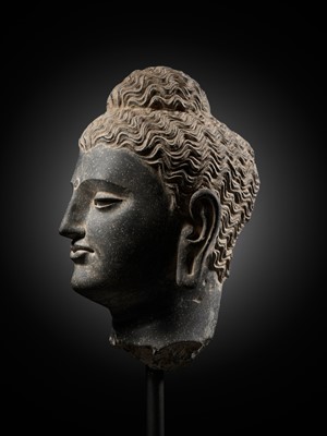 Lot 222 - A GRAY SCHIST HEAD OF BUDDHA, ANCIENT REGION OF GANDHARA, 2ND-3RD CENTURY