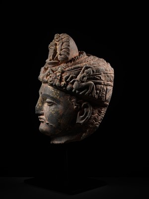 Lot 231 - A RARE GRAY SCHIST HEAD OF A BODHISATTVA WITH ‘GARUDA’ TURBAN CREST, ANCIENT REGION OF GANDHARA, 3RD-4TH CENTURY