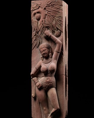 Lot 239 - A RED SANDSTONE RELIEF OF A SHALABHANJIKA, MATHURA, SHUNGA PERIOD