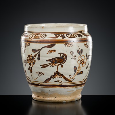 Lot 516 - A CIZHOU PAINTED ‘BIRDS AND FLOWERS’ JAR, MING DYNASTY