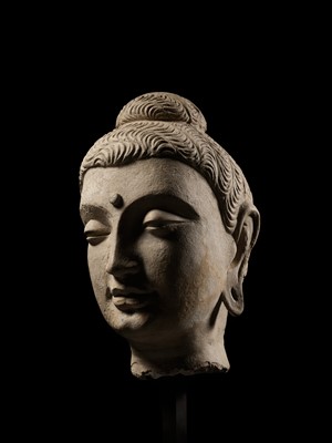 A LARGE STUCCO HEAD OF BUDDHA, GANDHARA, 3RD CENTURY