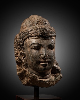 Lot 604 - AN ANDESITE HEAD OF SHIVA, INDONESIA, CENTRAL JAVA, 8TH-9TH CENTURY