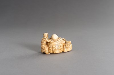 Lot 315 - CHIKAHIDE: AN IVORY OKIMONO OF HOTEI WITH TWO KARAKO