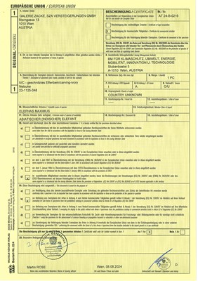 Lot 315 - CHIKAHIDE: AN IVORY OKIMONO OF HOTEI WITH TWO KARAKO