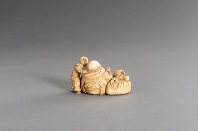 Lot 315 - CHIKAHIDE: AN IVORY OKIMONO OF HOTEI WITH TWO KARAKO