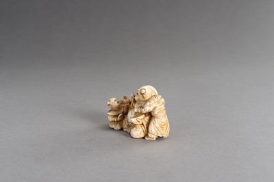 Lot 315 - CHIKAHIDE: AN IVORY OKIMONO OF HOTEI WITH TWO KARAKO