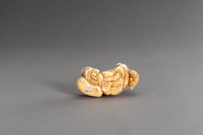 Lot 315 - CHIKAHIDE: AN IVORY OKIMONO OF HOTEI WITH TWO KARAKO