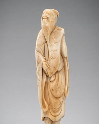 Lot 1270 - AN IVORY NETSUKE OF A SENNIN WITH SCROLL, 18th CENTURY