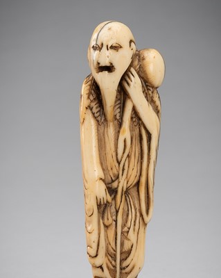 Lot 1272 - AN IVORY NETSUKE OF CHOKARO SENNIN, 18TH CENTURY