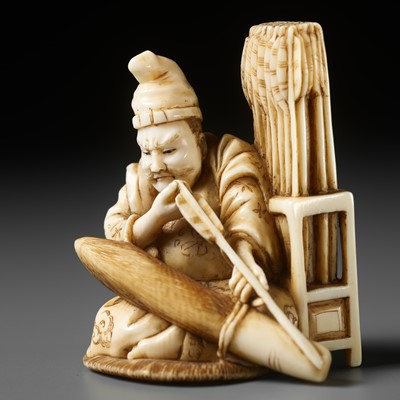 Lot 702 - SADAMASA: A FINE NETSUKE-OKIMONO OF AN ARCHER INSPECTING HIS ARROWS