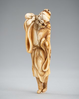 Lot 1243 - A MARINE IVORY NETSUKE OF A SENNIN, EDO PERIOD