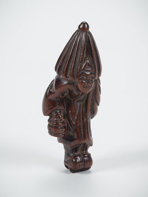 Lot 505 - A BOXWOOD NETSUKE OF A SHINTO PRIEST, 18TH CENTURY