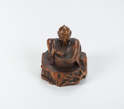 A WOOD NETSUKE OF HANASAKA JIJI, EDO PERIOD