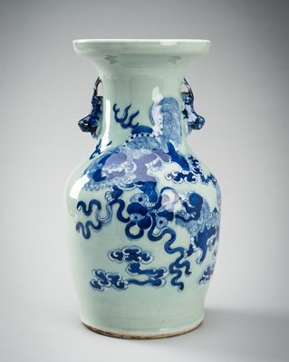 Lot 1754 - A BLUE AND WHITE CELADON-GLAZED ‘LIONS’ VASE, c. 1920s