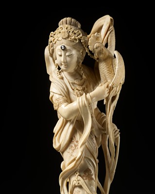 Lot 368 - MASANAO: A SUPERB IVORY OKIMONO OF THE GODDESS UZUME WITH ROOSTER