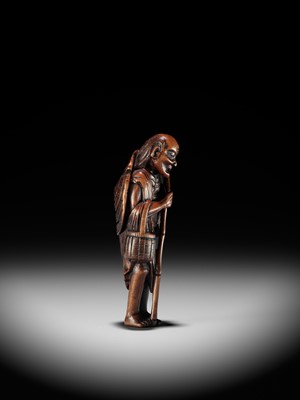 Lot 323 - A LARGE AND RARE WOOD NETSUKE OF ONO NO KOMACHI