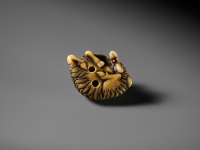 Lot 44 - A FINE MARINE IVORY NETSUKE OF A RECLINING GOAT