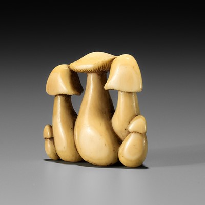 Lot 38 - YOSHITADA: A FINE IVORY NETSUKE OF A CLUSTER OF MUSHROOMS