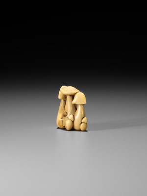 Lot 38 - YOSHITADA: A FINE IVORY NETSUKE OF A CLUSTER OF MUSHROOMS