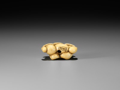 Lot 38 - YOSHITADA: A FINE IVORY NETSUKE OF A CLUSTER OF MUSHROOMS