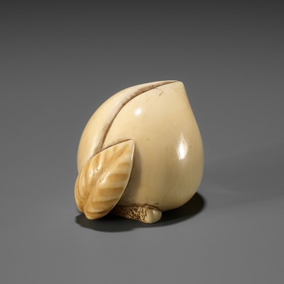 Lot 39 - RANICHI: AN IVORY NETSUKE OF A PEACH