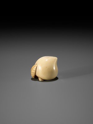 Lot 39 - RANICHI: AN IVORY NETSUKE OF A PEACH