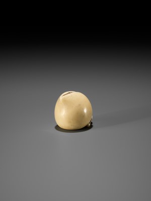 Lot 39 - RANICHI: AN IVORY NETSUKE OF A PEACH