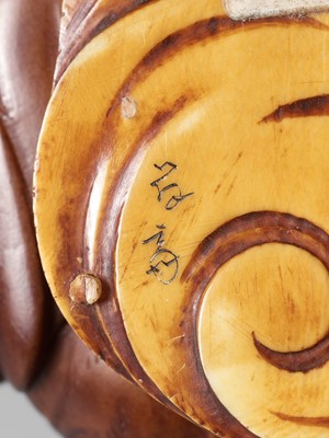 Lot 317 - OSAI: A WOOD OKIMONO OF RAIJIN DISCHARGING A STORM